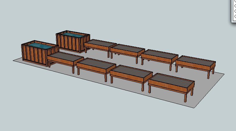A CAD render of the site layout with the tank and the run of grow beds arranged.