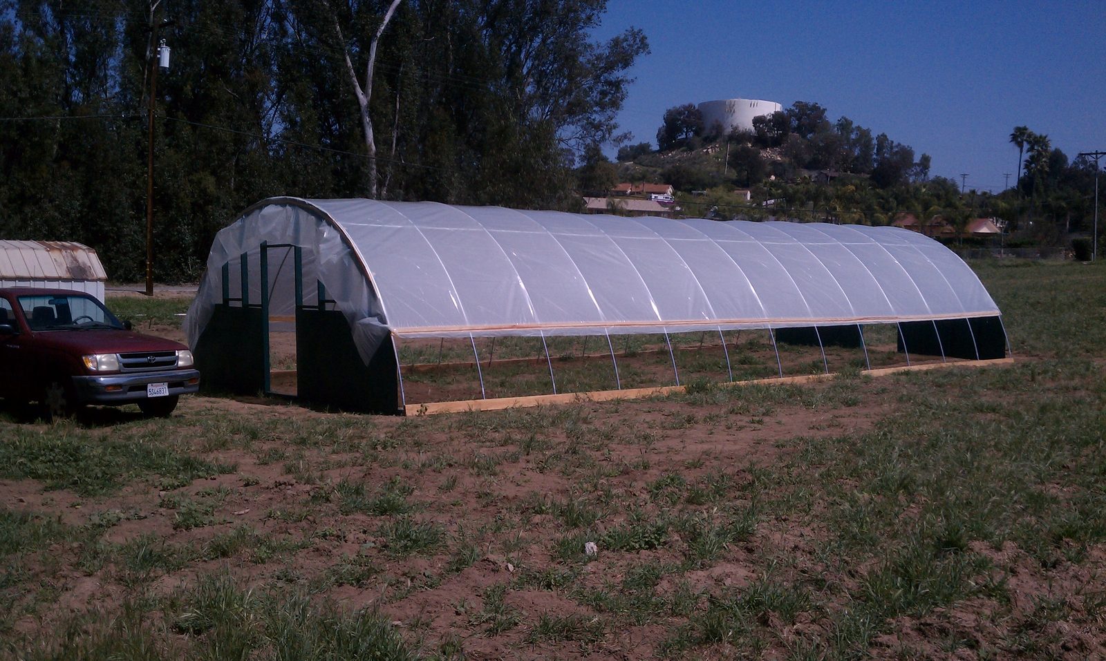 The finished hoop house standing in the open field in Fallbrook, 2013.